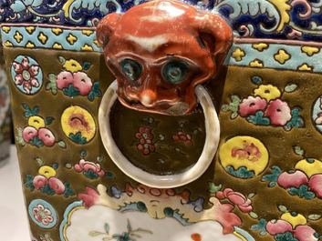 A pair of square Chinese famille rose brown-ground vases, 19th C.